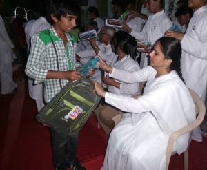 BK Ishitaben Distributing Gifts to Divya Nagari Children